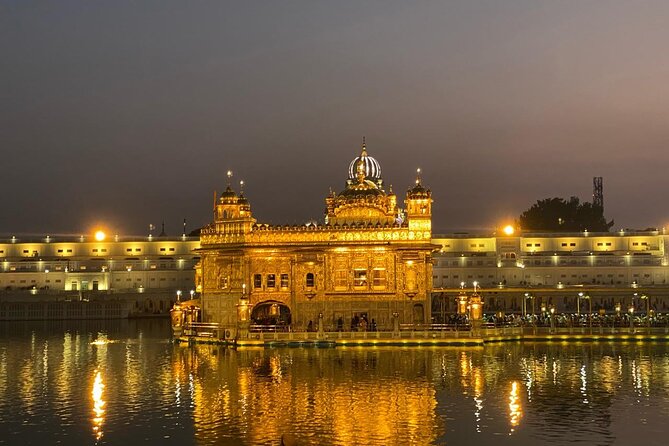 Golden Temple Night Ceremony and Light Visit Tour with Pick-Drop - What you get included: head cover, water, and jalebi